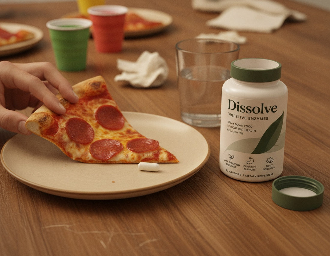 A bottle of Dissolve on the dinner table beside a plate of pepperoni pizza, with one capsule on the plate